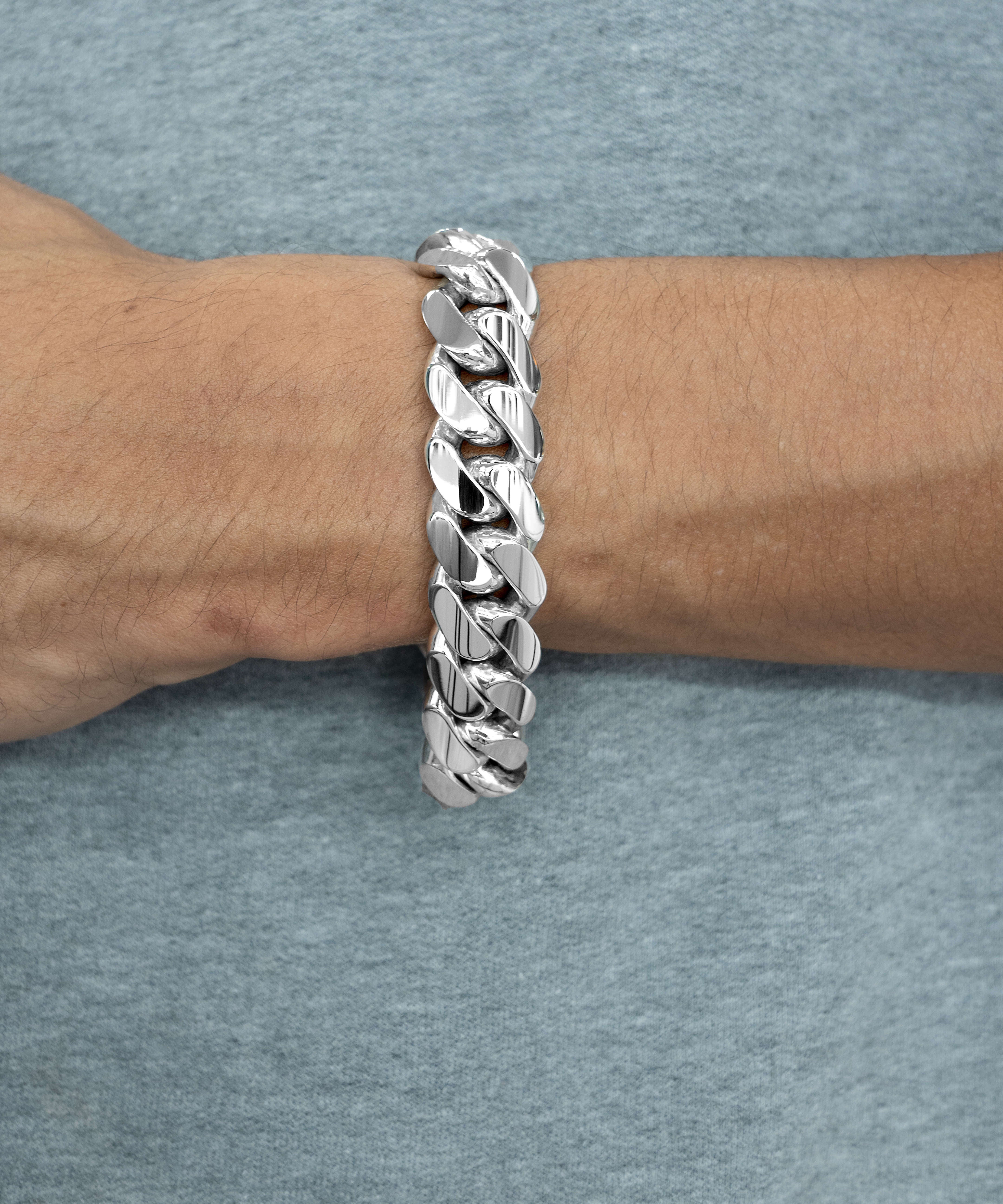 16 mm silver cuban link bracelet on wrist