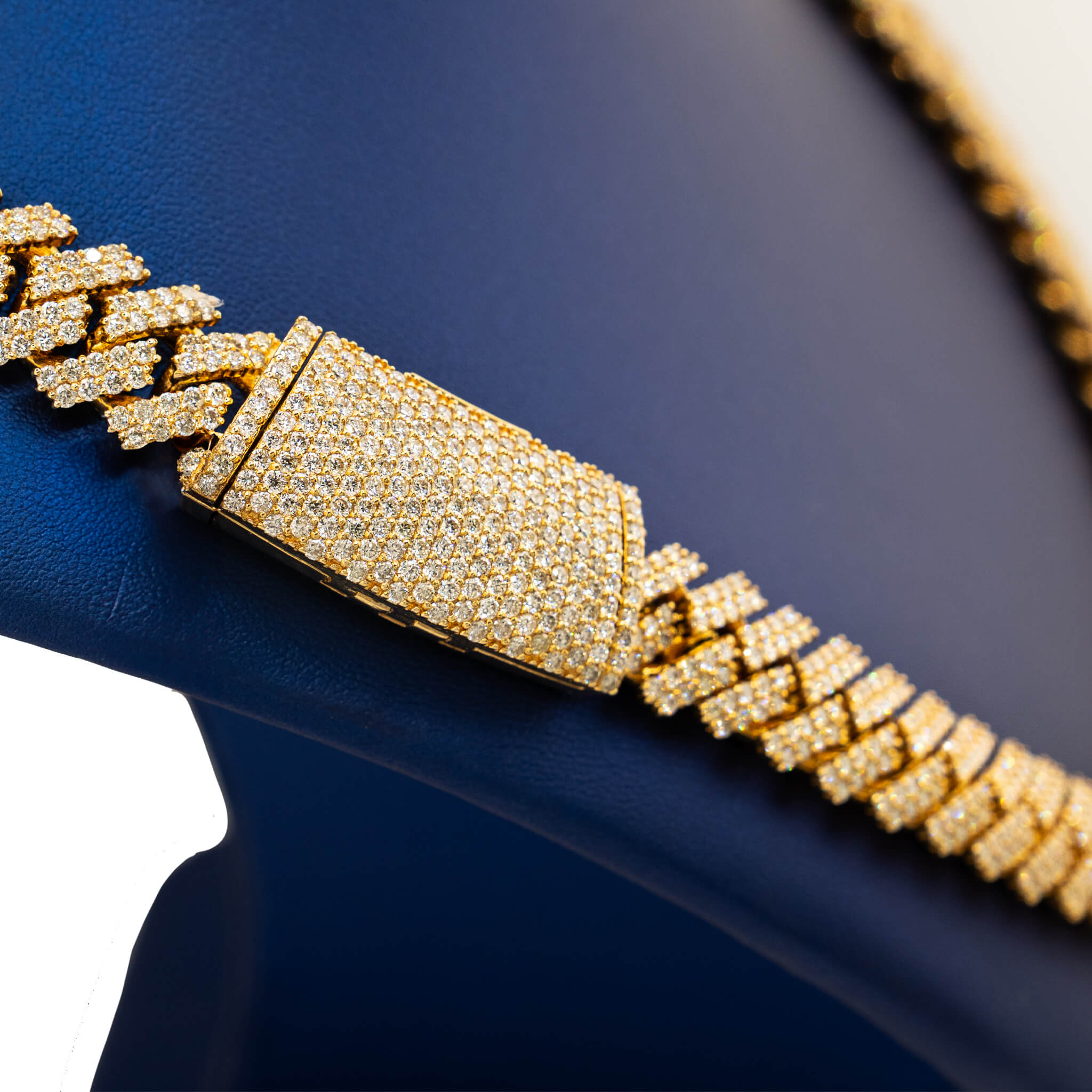 a diamond cuban link chain with diamond lock box