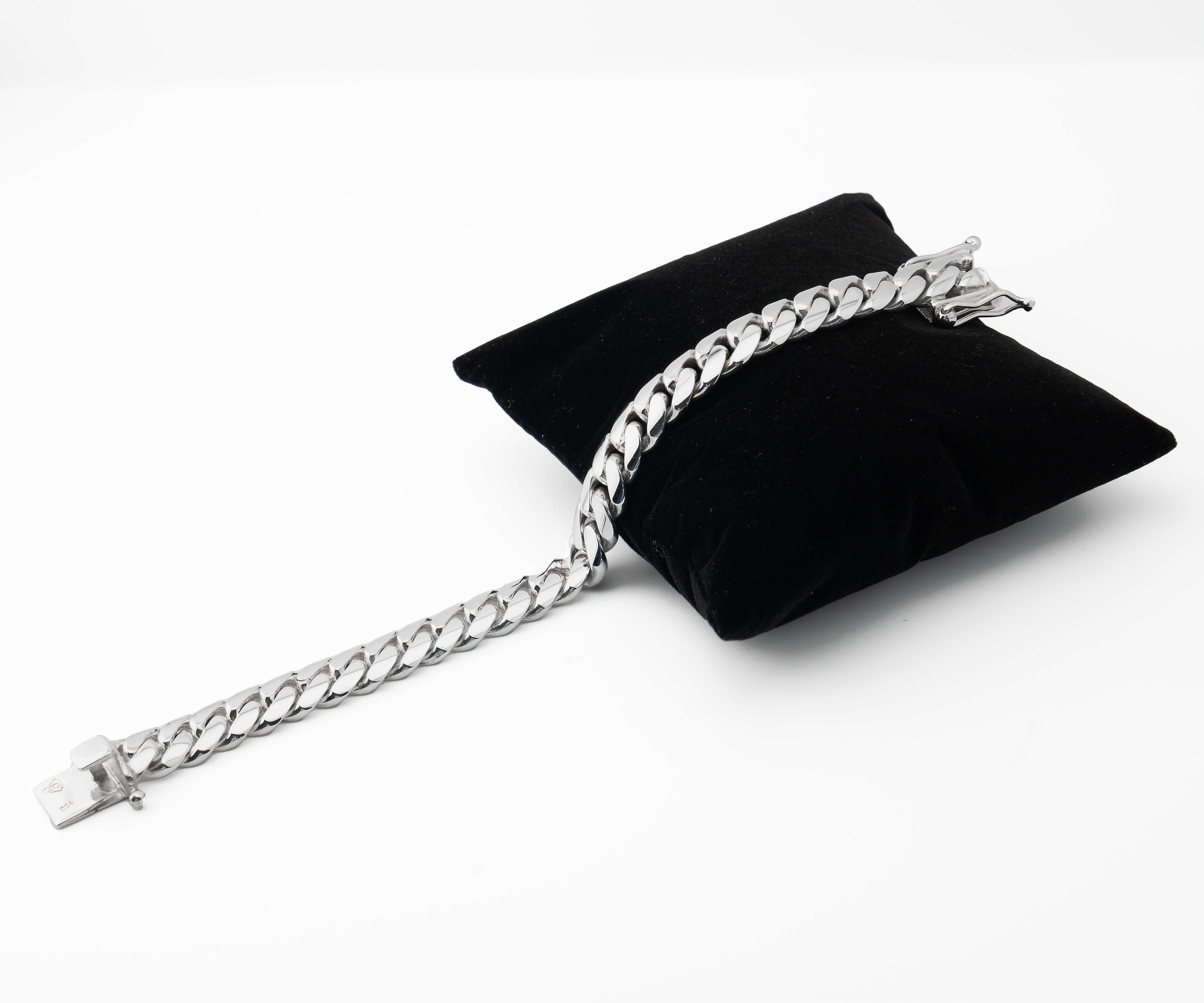 12 mm silver cuban link bracelet on pillow