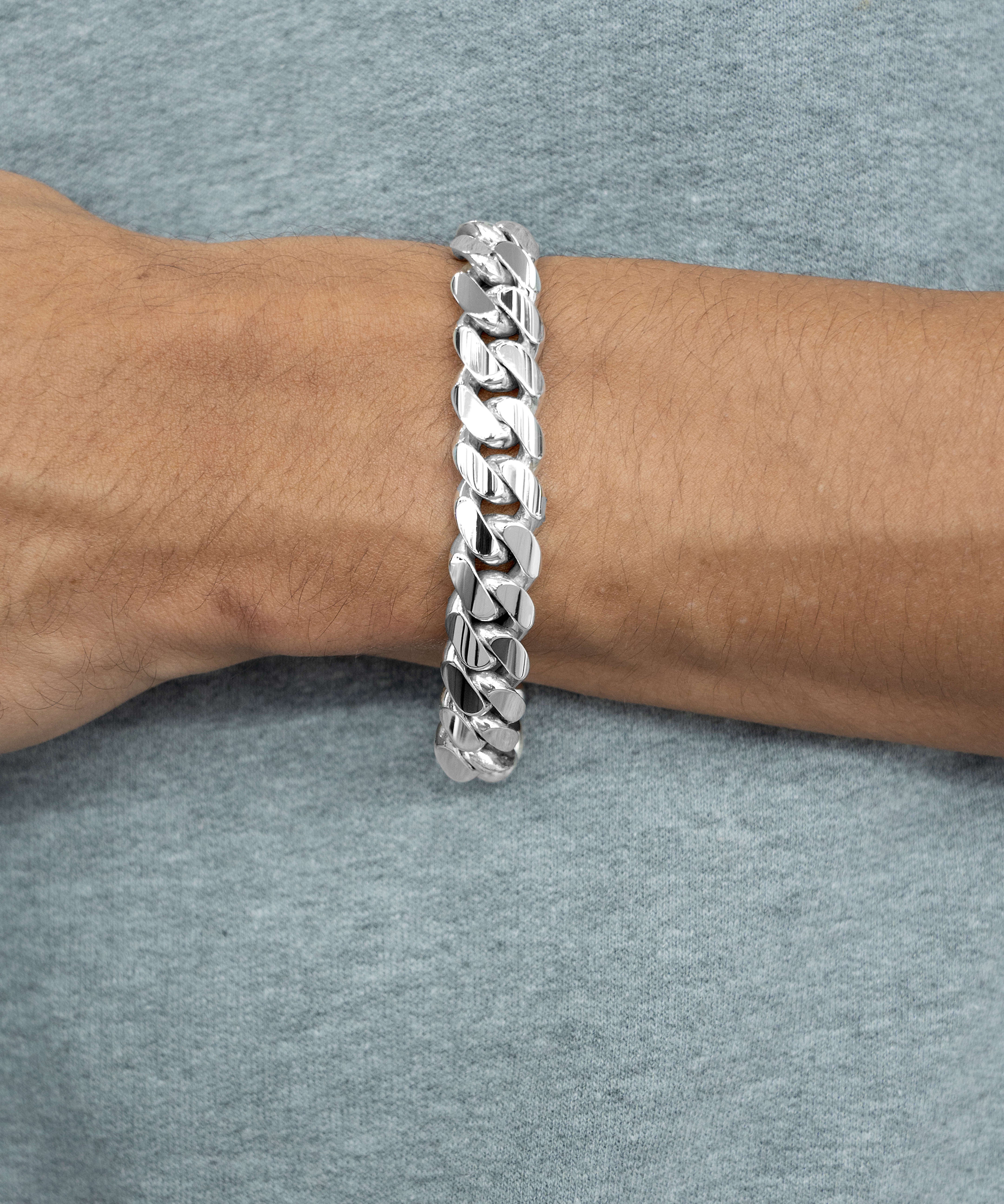 12 mm silver cuban link bracelet on wrist