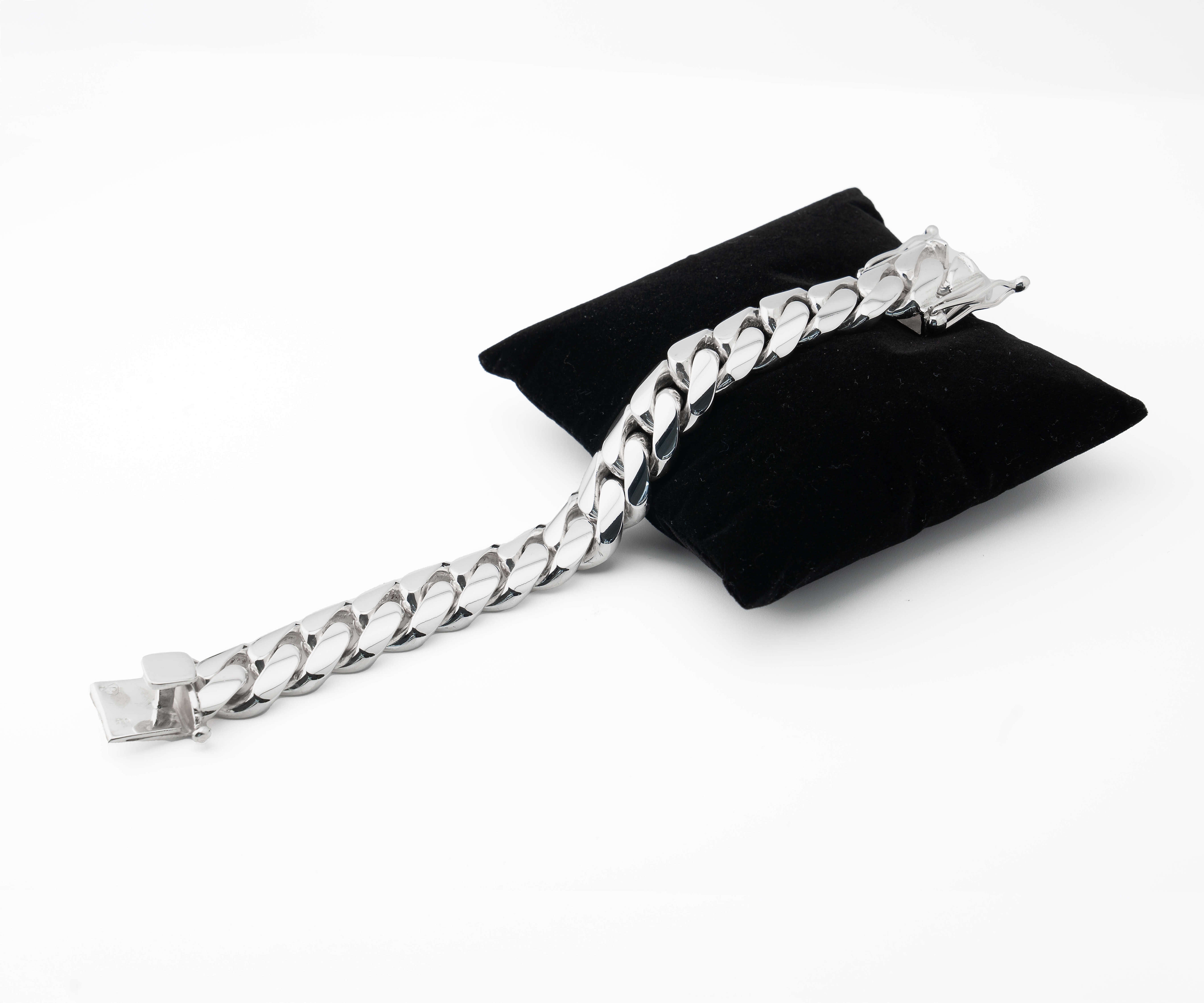 18 mm silver cuban link bracelet on pillow