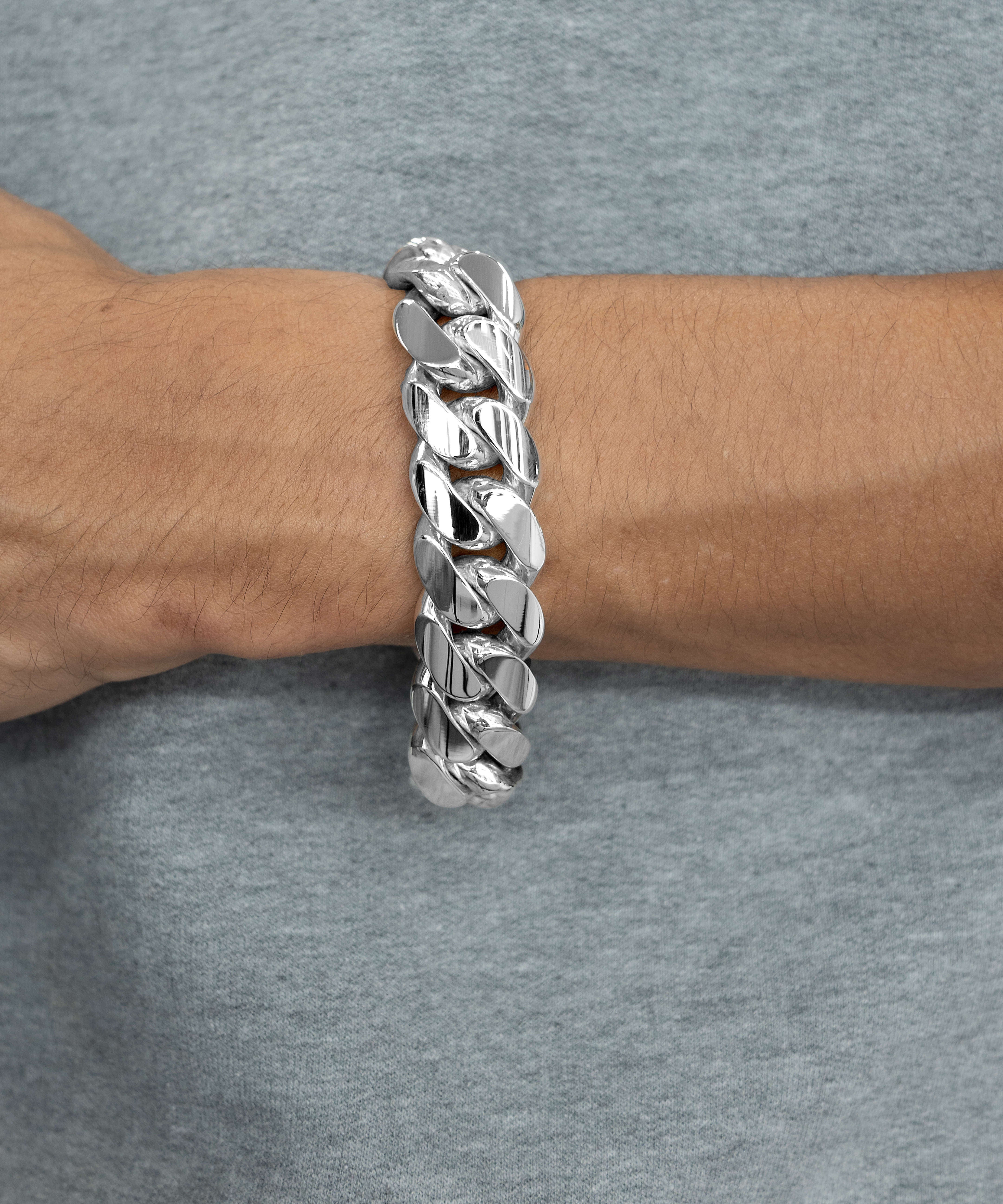 18 mm silver cuban link bracelet on wrist